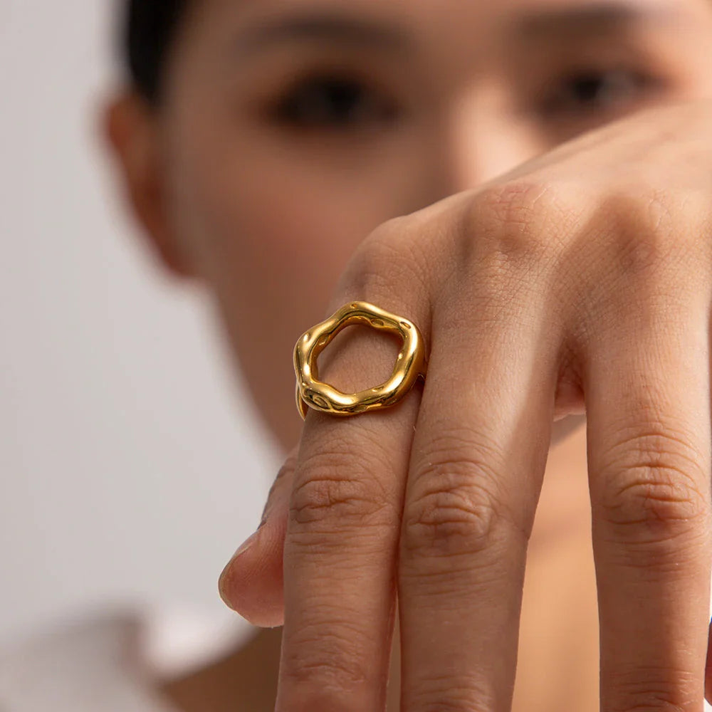 18K gold plated stainless steel geometric ring with an exaggerated irregular shape, a unique and bold accessory for fashion-forward women