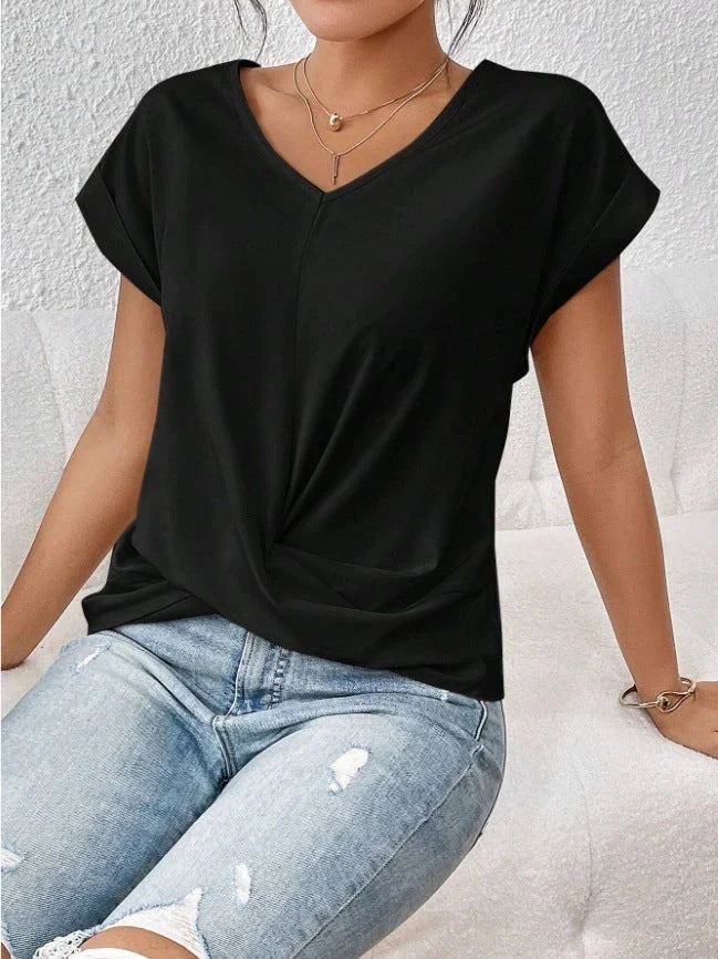 Stylish short-sleeve ladies' t-shirt with unique knot detail, available in a range of vibrant colours