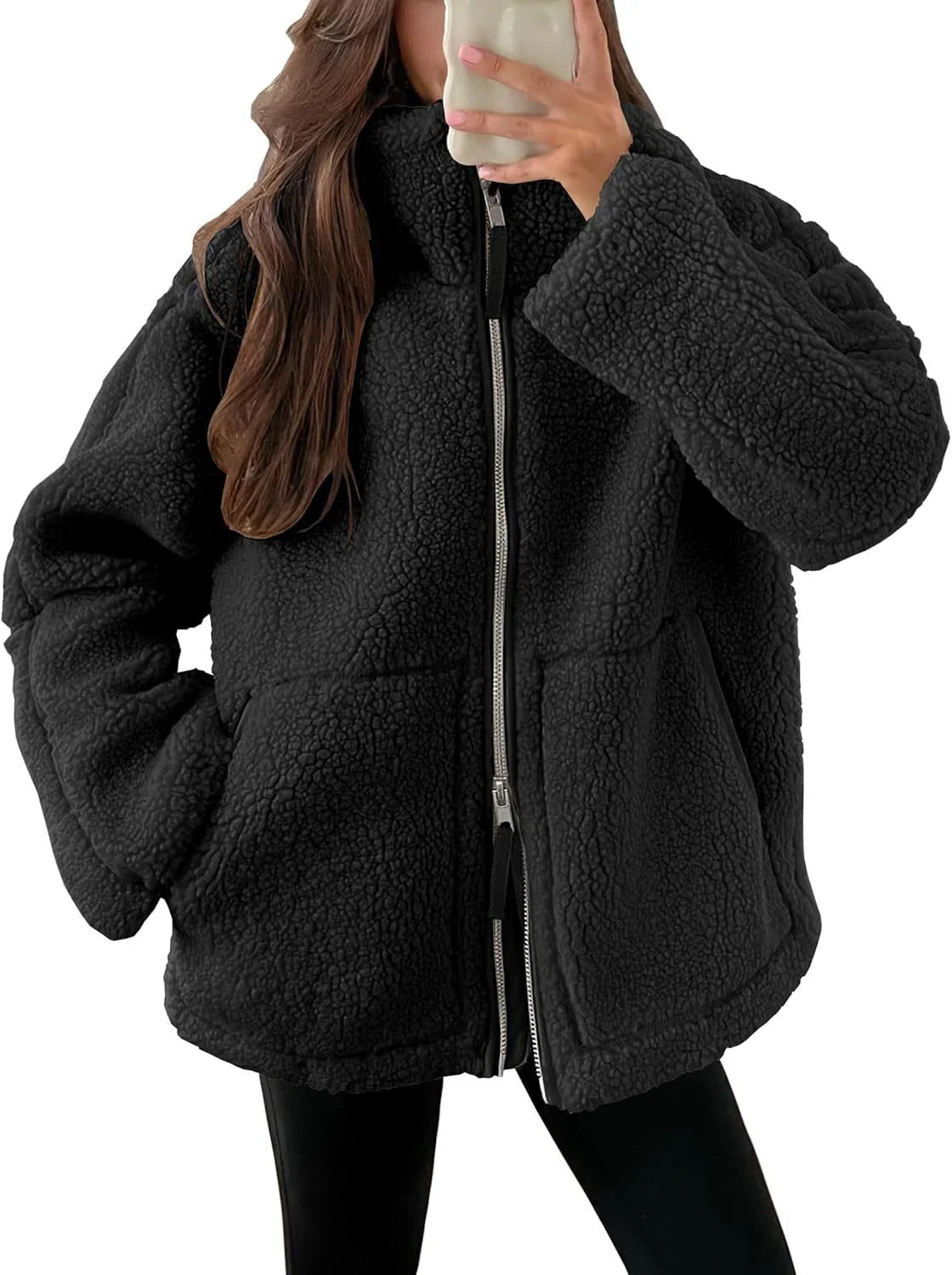 Classic padded fleece jacket in various colours for women, featuring a zip-up design and pockets