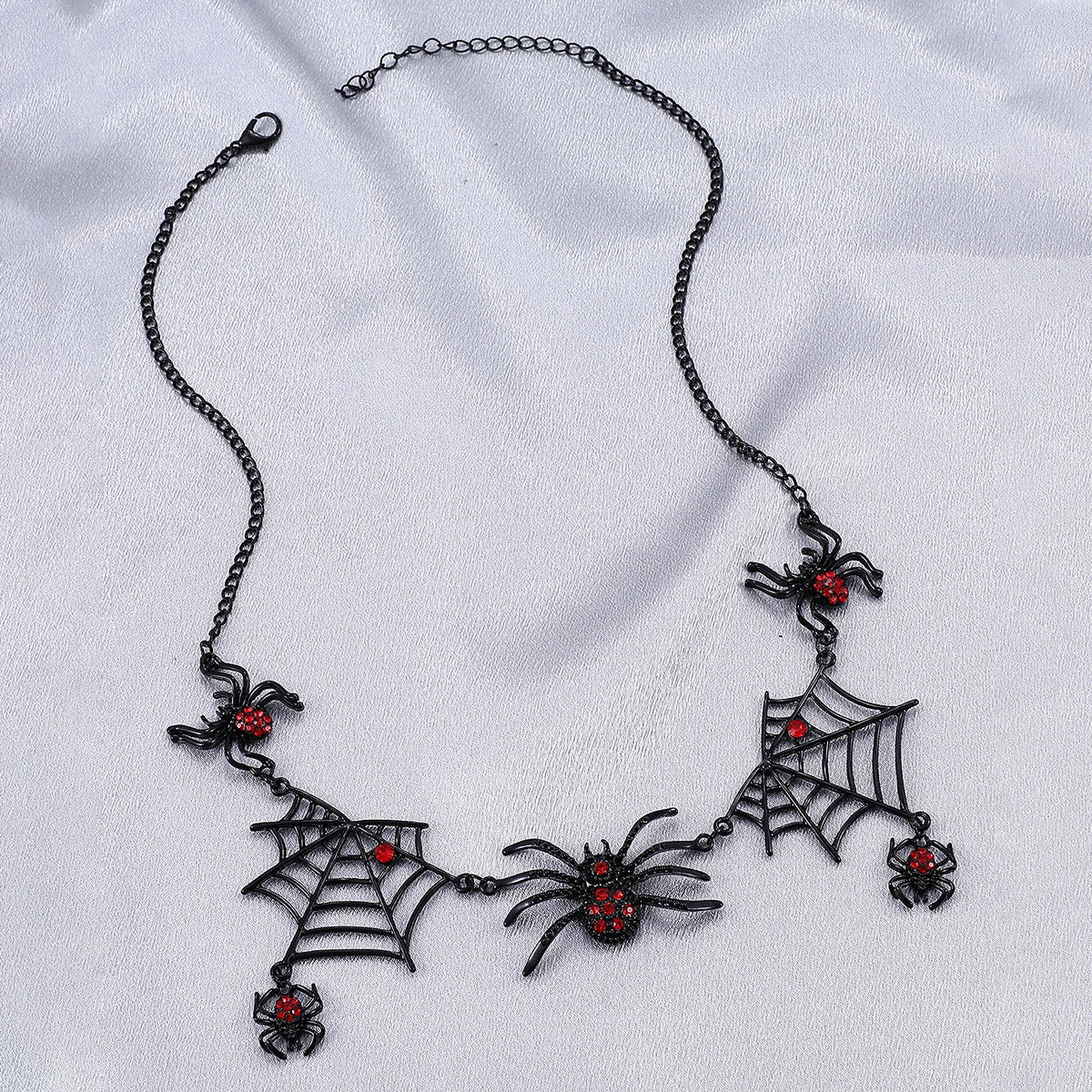 Spooky spider and spider web clavicle necklace, a must-have Halloween fashion accessory with adjustable length and captivating design.