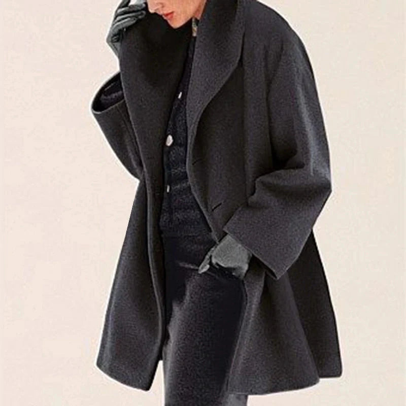 A stylish woollen coat in a variety of vibrant colours, perfect for the autumn and winter seasons.