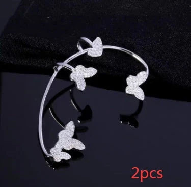 Sparkling butterfly-shaped ear cuffs with zirconia stones, available in gold and silver alloy finishes