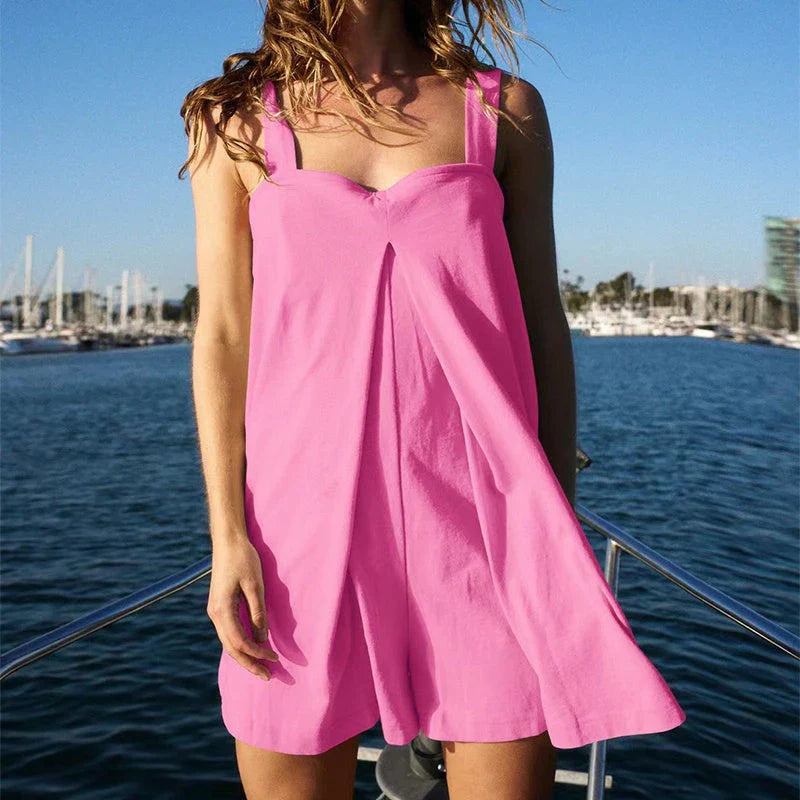 Sleeveless jumpsuit in various colors featuring a square neckline and relaxed fit for comfortable summer style