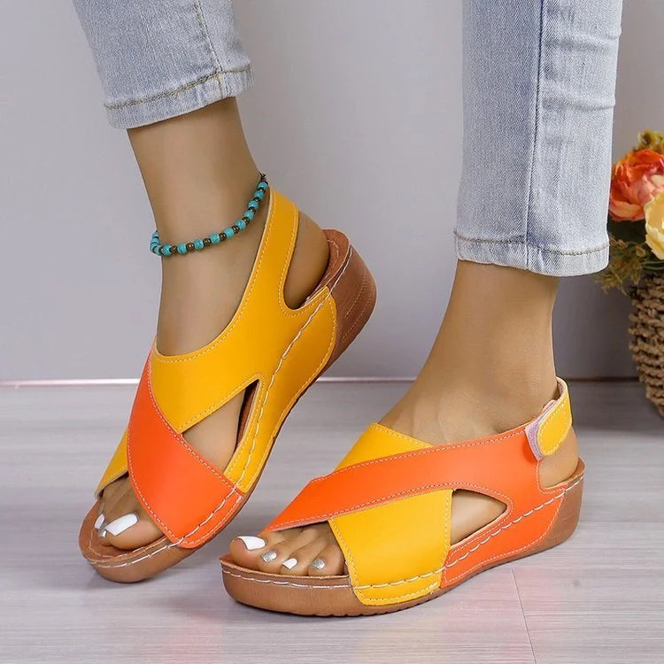 Stylish wedge sandals with a colourful cross-strap design for women's summer fashion
