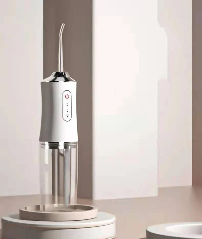 Rechargeable dental water flosser with multiple colour options and USB charging capability