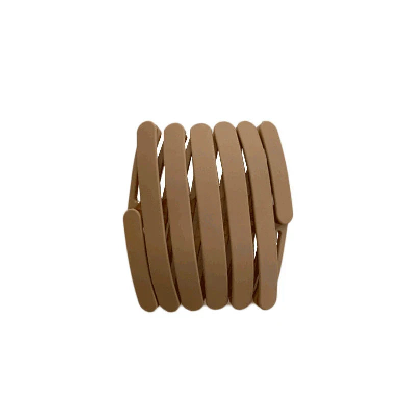 Retractable Pocket Hair Band - A stylish, secure, and convenient hair accessory that can be easily stored in your pocket or bag.