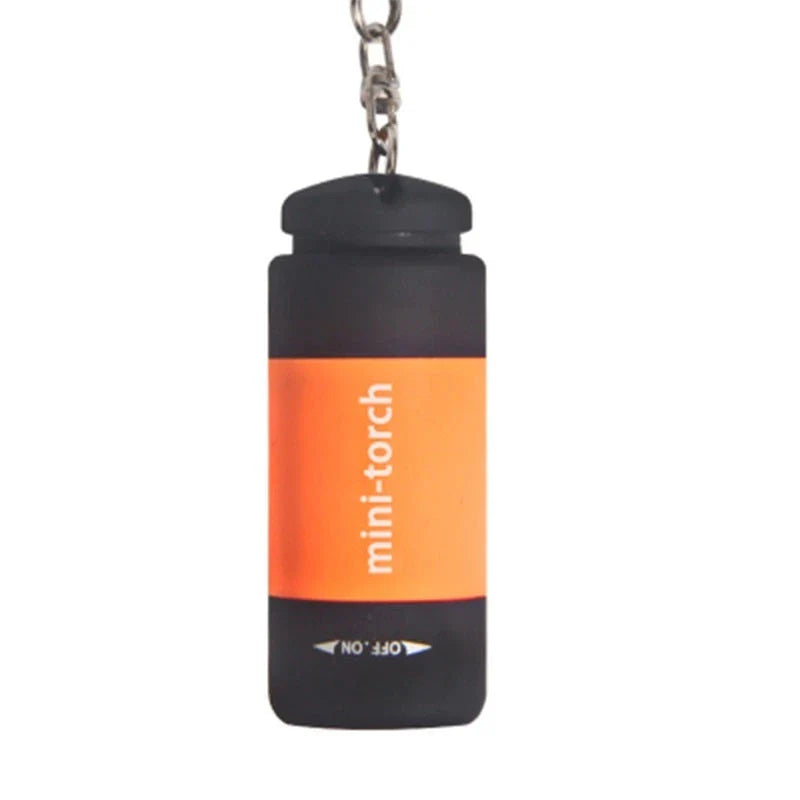 Compact USB rechargeable LED flashlight in various colors for everyday carry and outdoor use