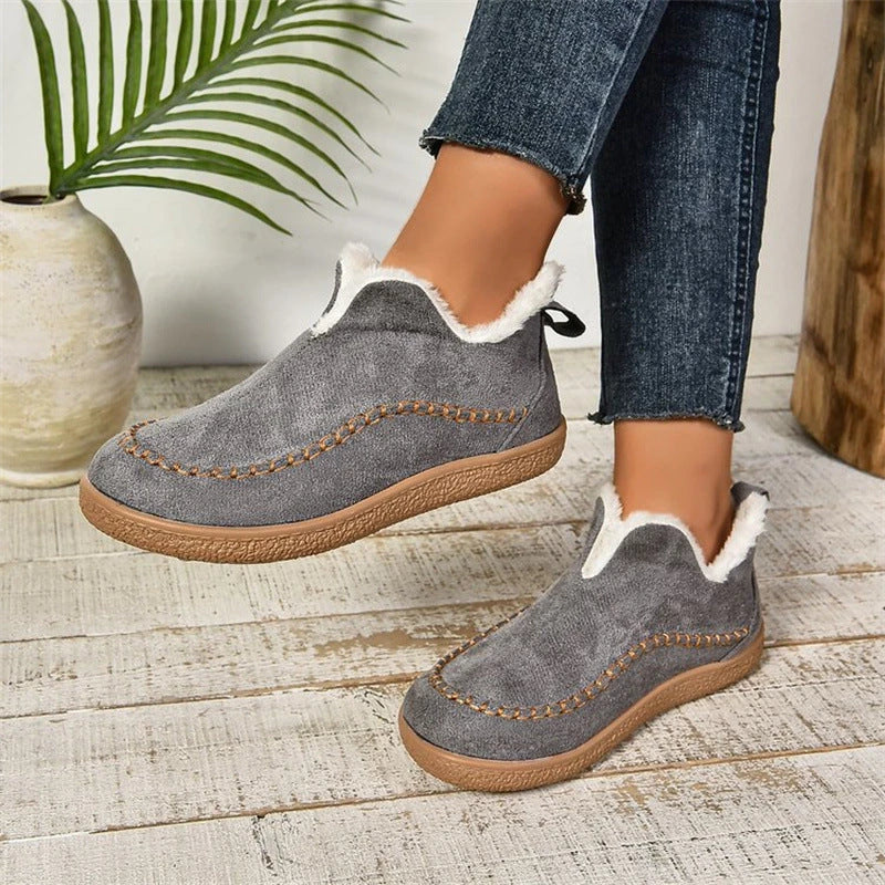 Stylish plush ankle boots with V-cut design, available in dark grey, black, light brown, and milky white colors