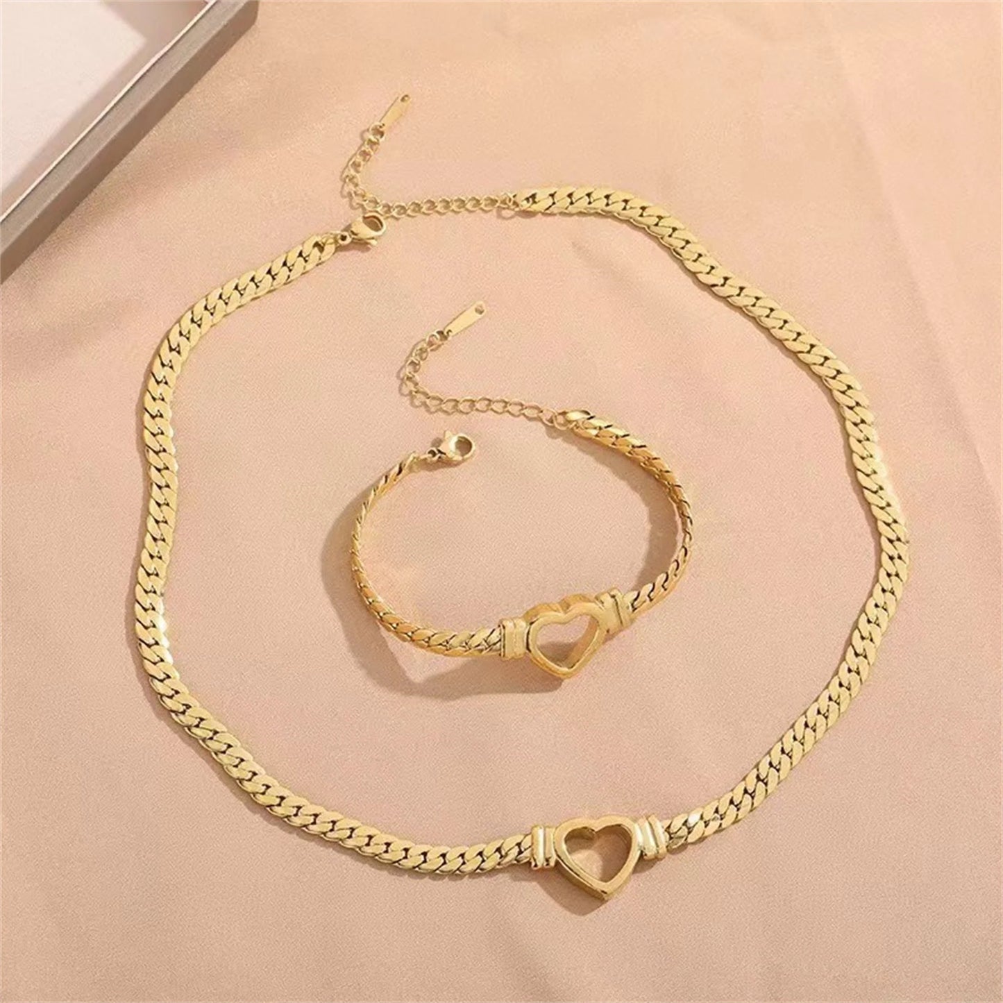 Personalised love chain necklace and bracelet set in titanium steel with heart-shaped design
