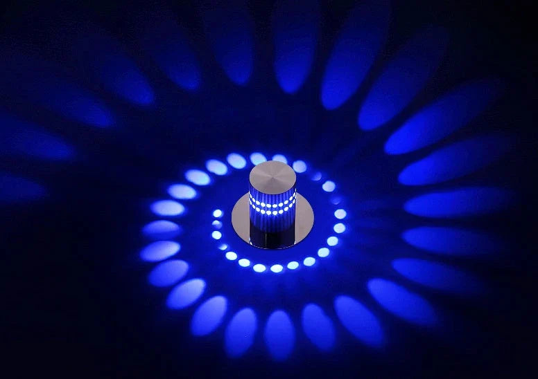 Colorful LED wall lights with a spiral design, featuring a wireless remote control for adjusting the vibrant color-changing display.