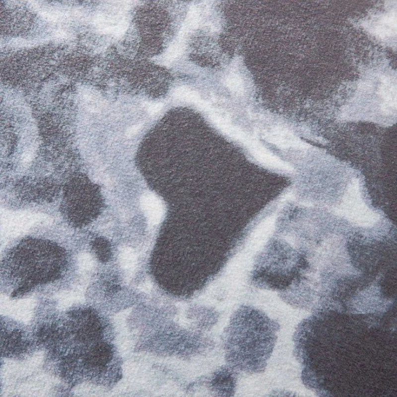 A plush, soft, and cuddly grey or white seal-shaped cushion with a detailed, lifelike design