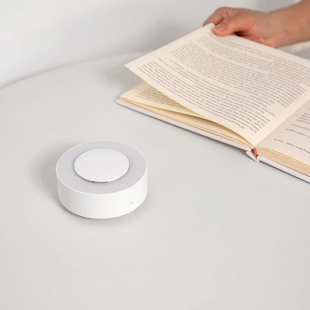 White aromatherapy mosquito repellent lamp with USB cable, modern design