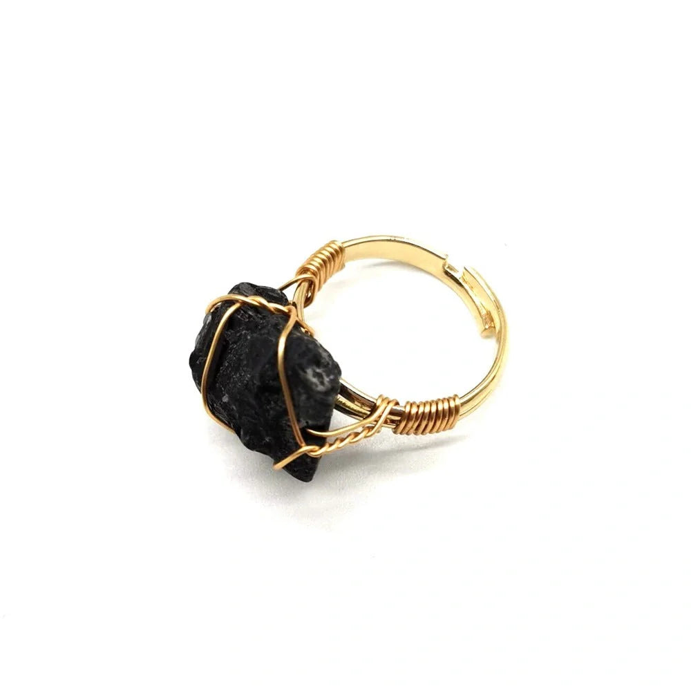 Handcrafted agate stone ring featuring an array of natural gemstones in various colours, with an adjustable design for a customized fit.