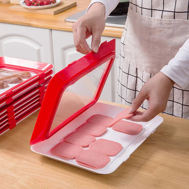 Premium food-preserving vacuum trays for fridge storage in black, green, red, and gold colours