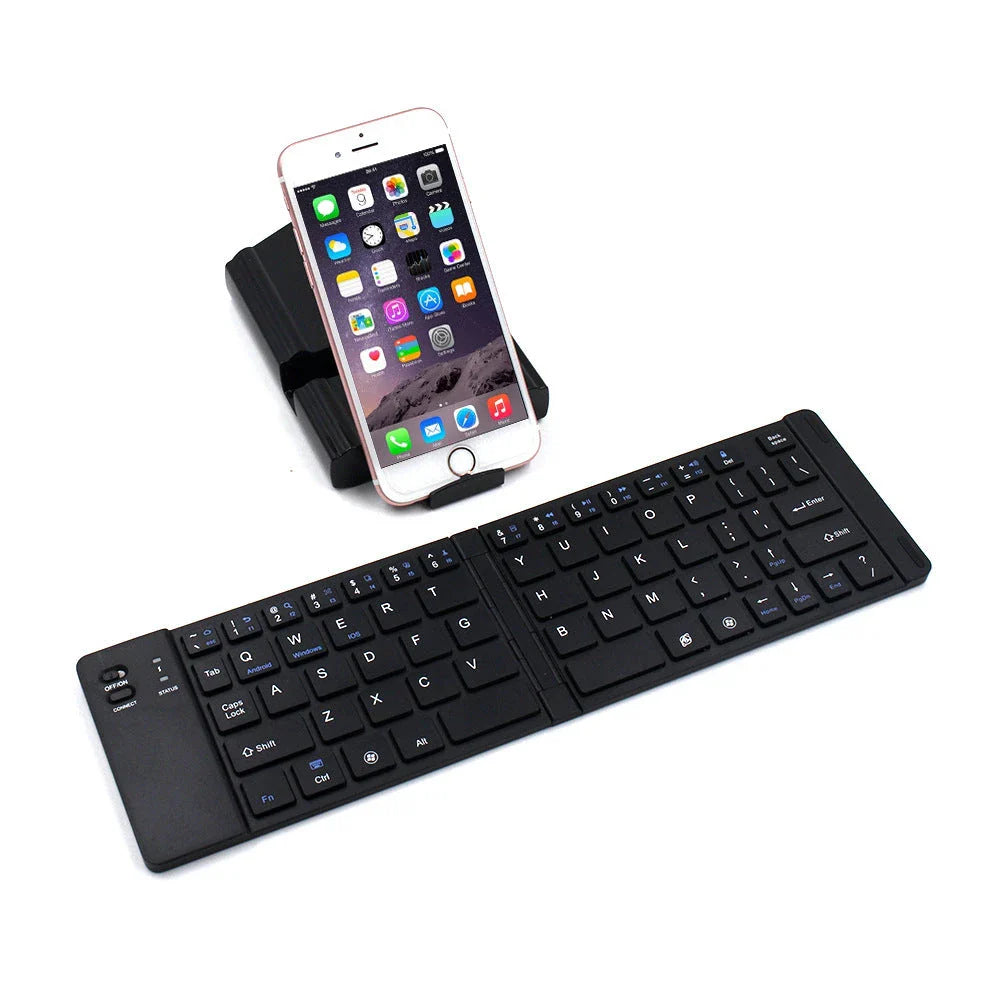 Compact and foldable Bluetooth keyboard for use with smartphones, tablets, and laptops