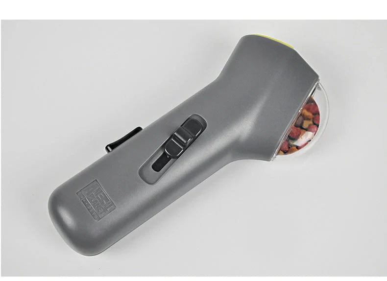 Dog Training Snack Launcher in grey, compact design for interactive pet play