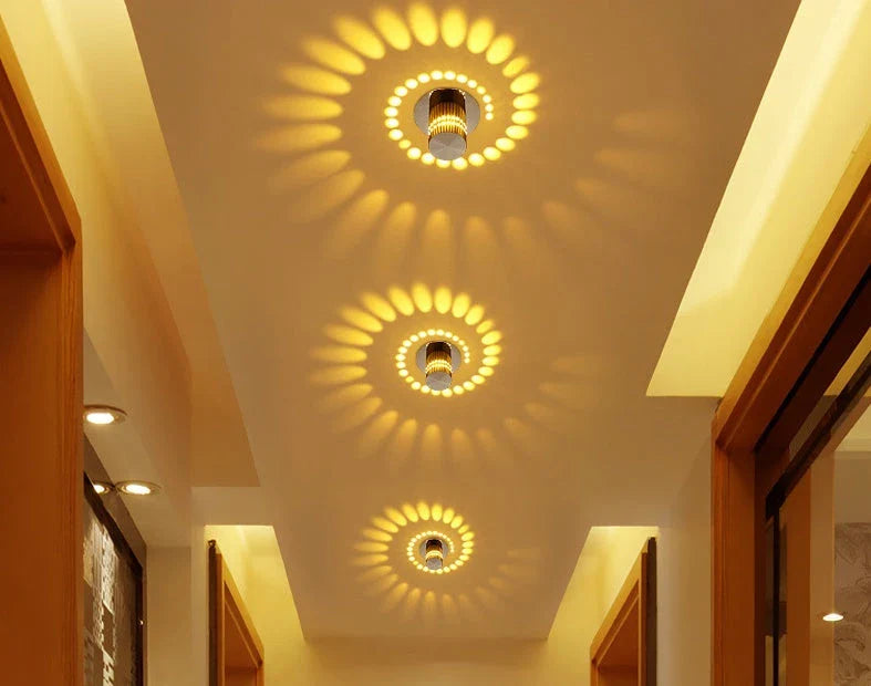 Colorful LED wall lights with a spiral design, featuring a wireless remote control for adjusting the vibrant color-changing display.