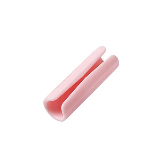 Non-slip sheet fixing clips in various colours for securing bedding and cushions