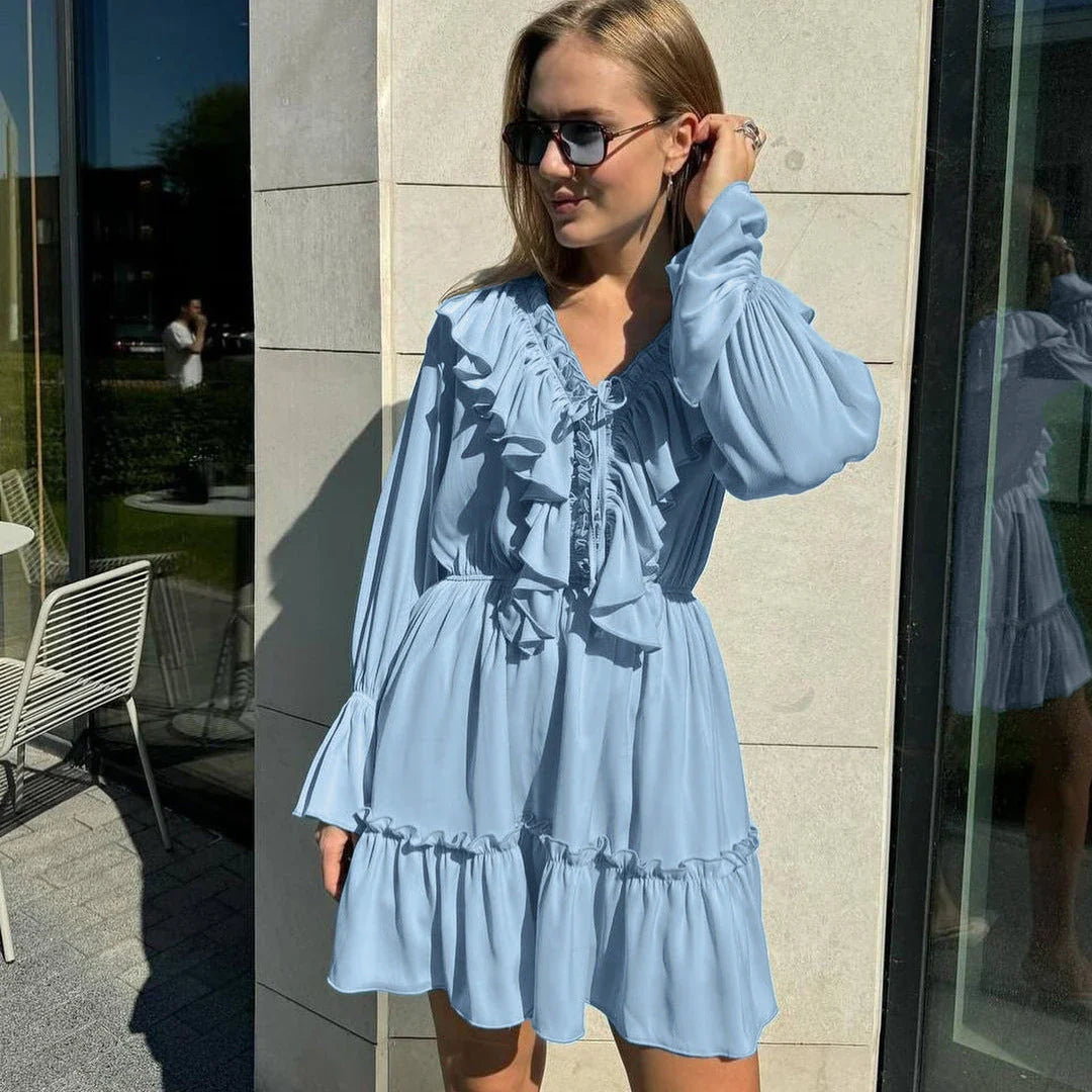 Stylish Y2K-inspired viscose dress with v-neck and flared sleeves, available in a range of vibrant colors