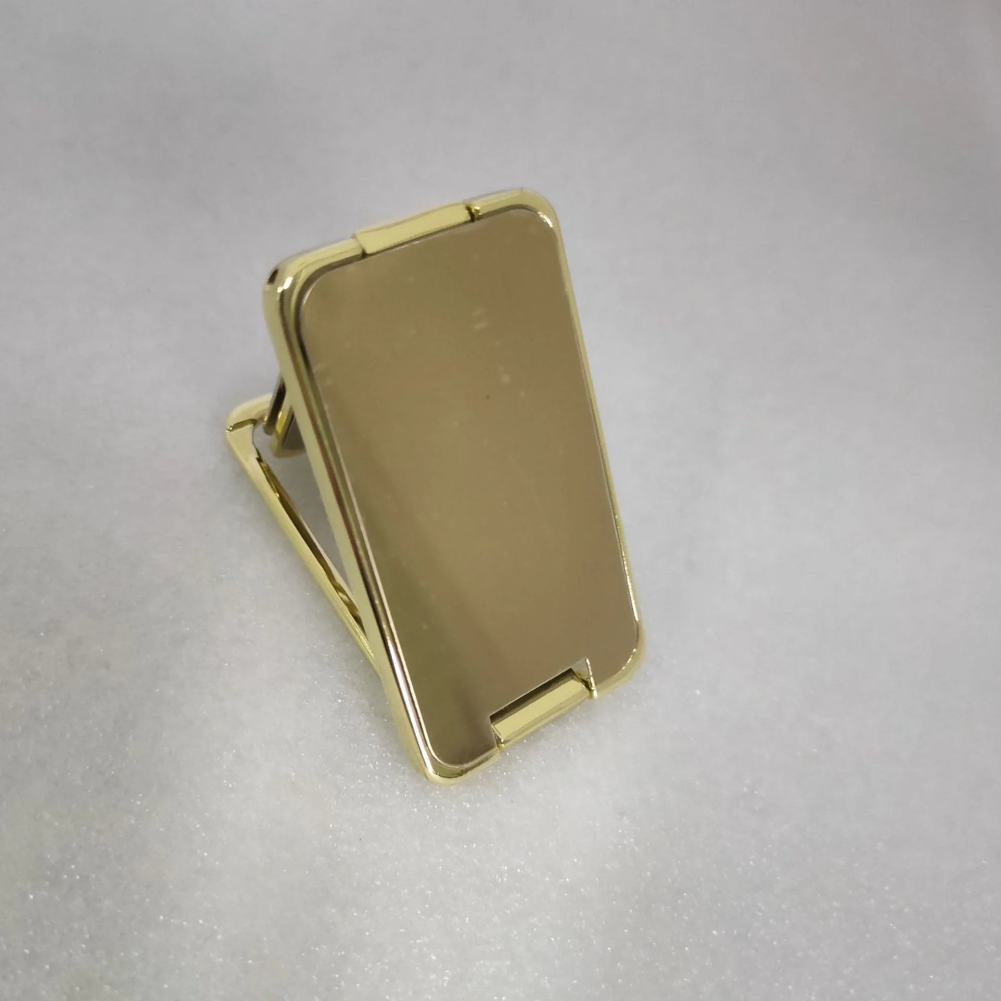 Adjustable folding mobile phone holder stand with multi-angle design, compatible with various smartphones and tablets