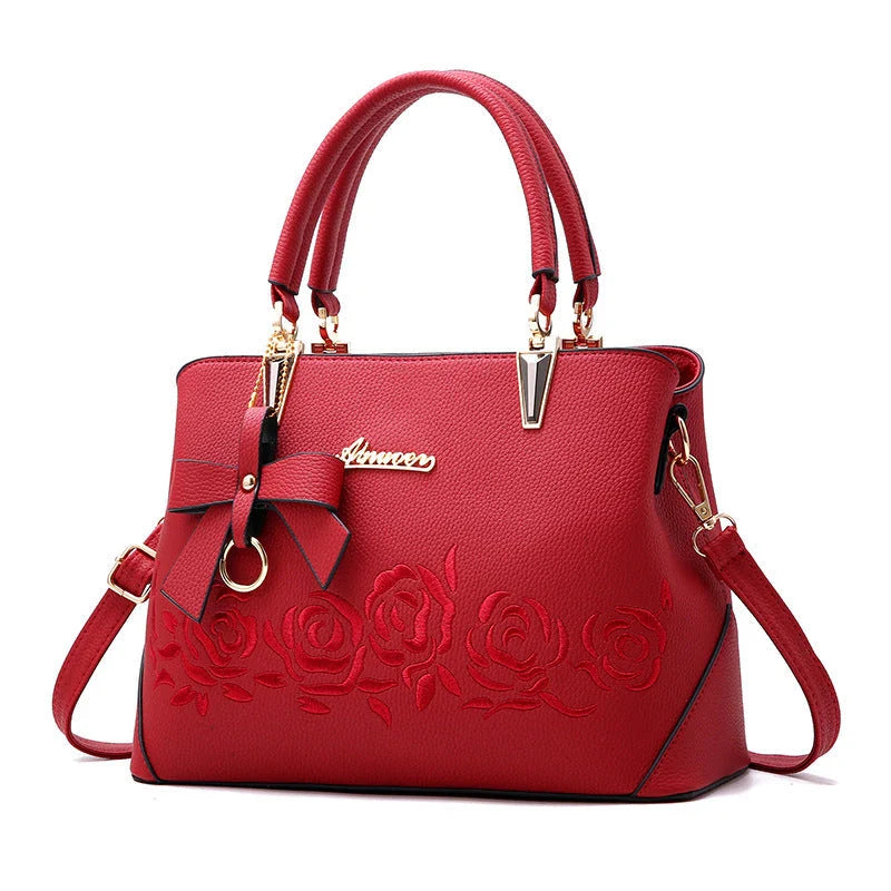 Stylish faux leather ladies' handbag in various colours, featuring a versatile single shoulder design and spacious interior