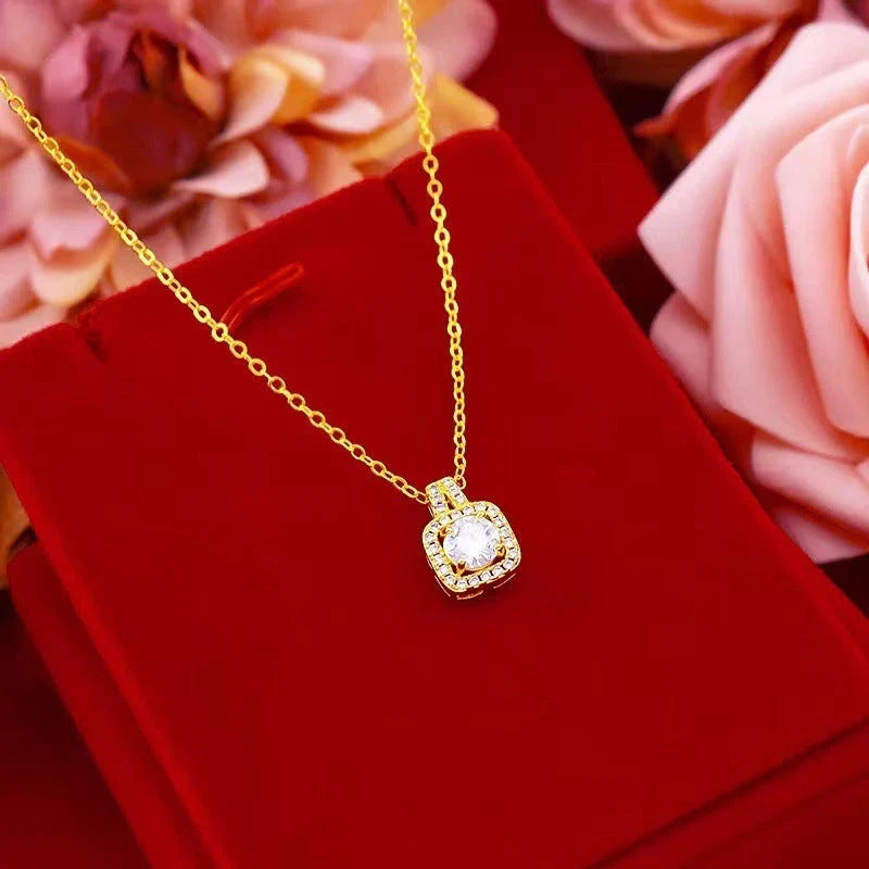 Elegant gold-toned jewelry set with zircon gemstone pendant necklace, stud earrings, and statement ring