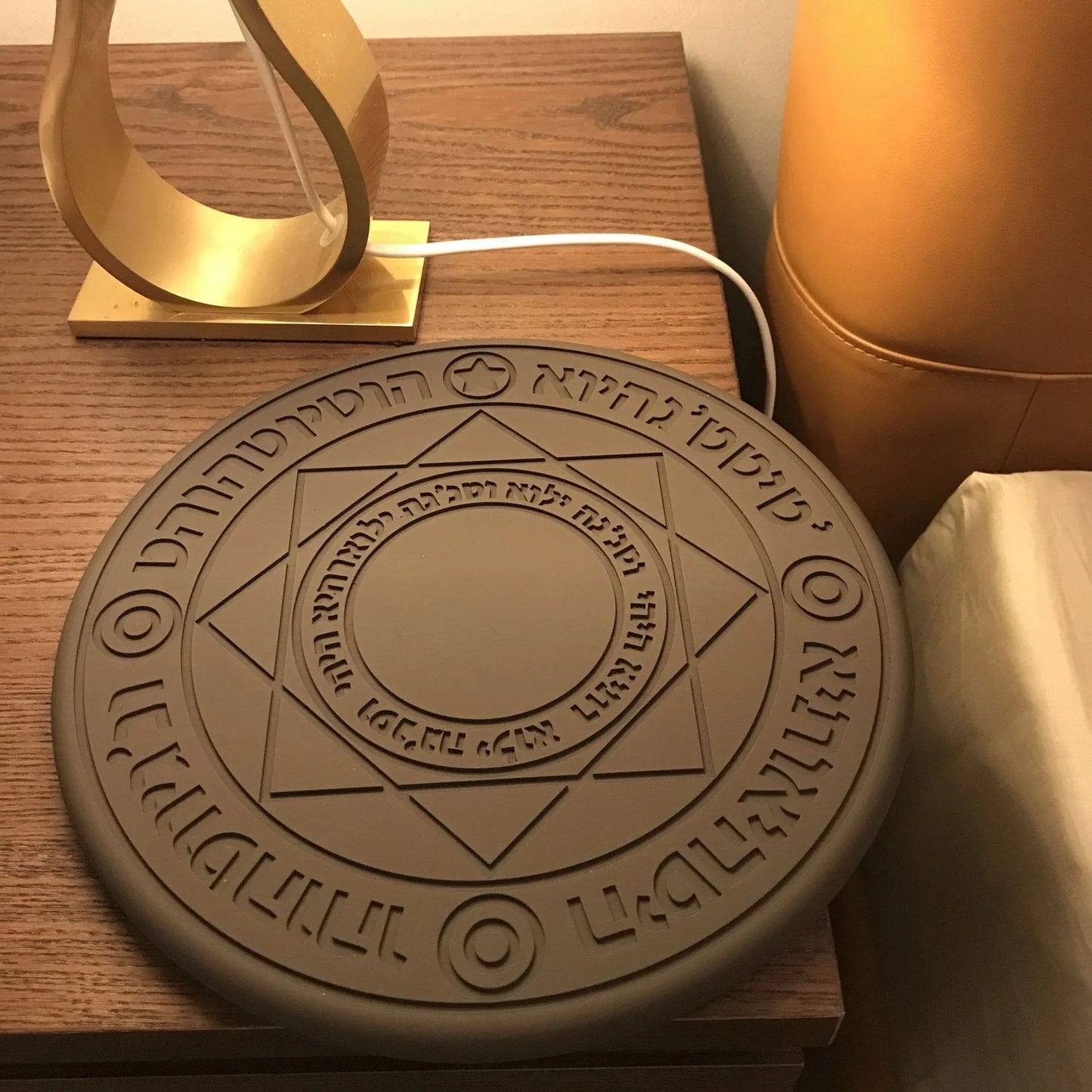Stylish wireless fast-charging phone dock with mesmerizing ambient glow for modern home and office use