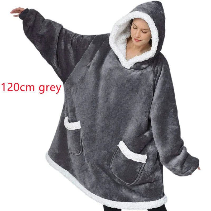 Comfy oversized TV hoodie blanket in various stylish colors, perfect for cozy movie nights and relaxation at home.
