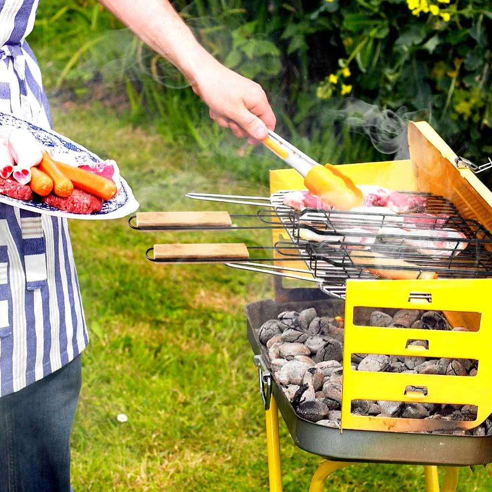 Premium stainless steel BBQ grill basket with rotary lid, wooden handle, and versatile design for outdoor cooking