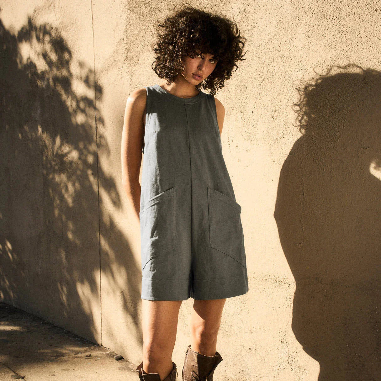 Stylish and comfortable cargo jumpsuit with pockets in various colors, including coffee, dark grey, army green, black, beige, and rose red.