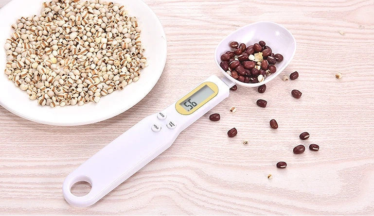Versatile digital kitchen scale with precise measurements from 0.1g to 500g, multiple unit options, and compact design for easy storage