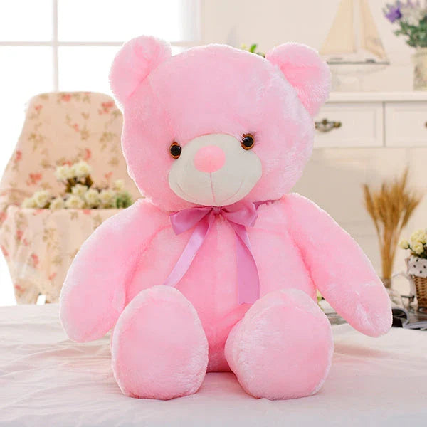 A soft and cuddly teddy bear plush toy with captivating color-changing LED lights, perfect for bringing wonder and delight to a child's room.