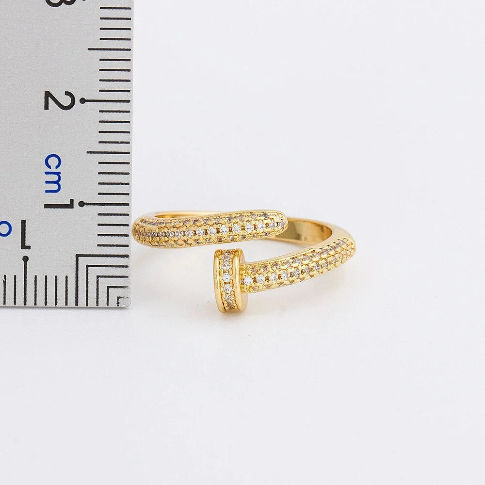 Adjustable geometric nail ring with gold-plated inlaid drill design