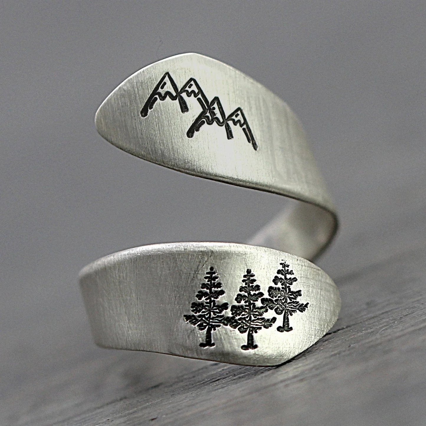 Elegant forest-themed adjustable ring with premium alloy construction and a comfortable, customizable fit