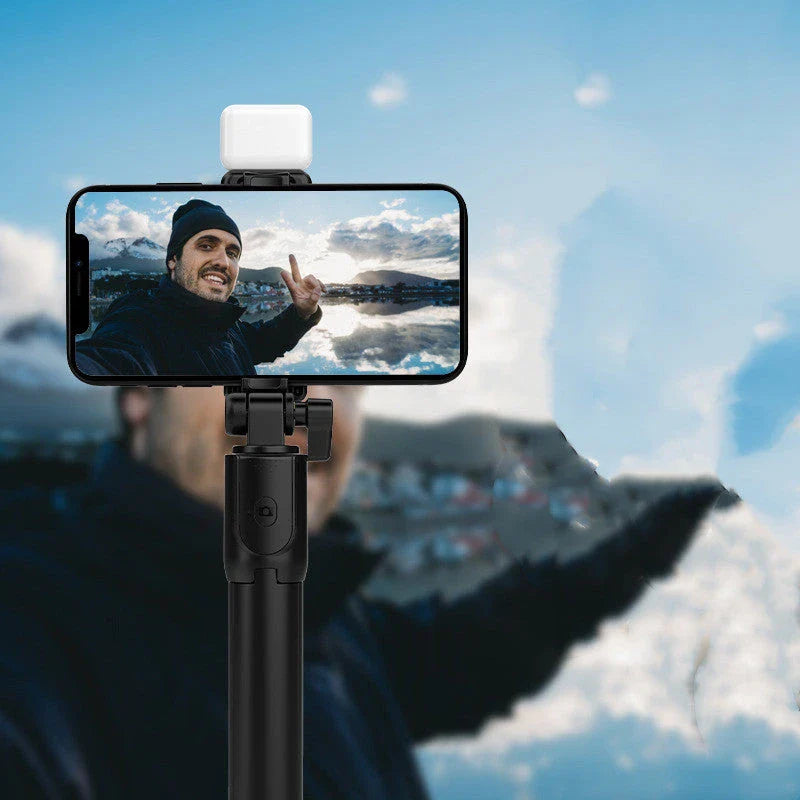 Premium Bluetooth Selfie Stick with 360-degree Rotation, Integrated Tripod, and Fill Light for iOS Devices