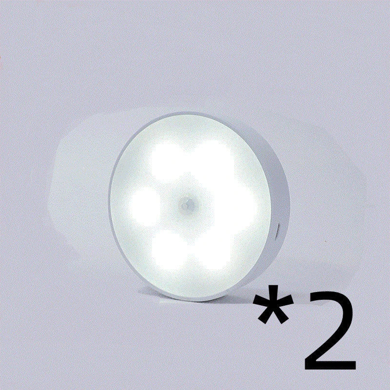 Motion-activated LED puck lights in warm and white color options, with various pack sizes and USB recharging