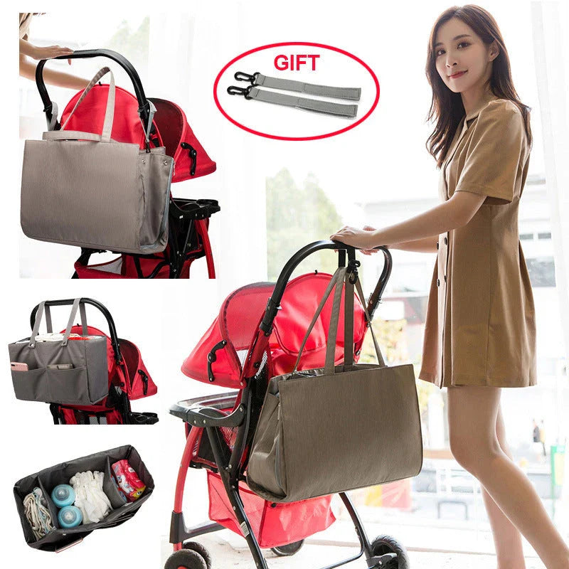 A premium quality mother and baby bag made from soft, durable Oxford cloth with a large 20-35L capacity, versatile backpack or shoulder bag design, and customisable interior pockets.