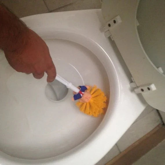 Hilarious Trump-themed toilet brush with bright yellow color and distinctive design