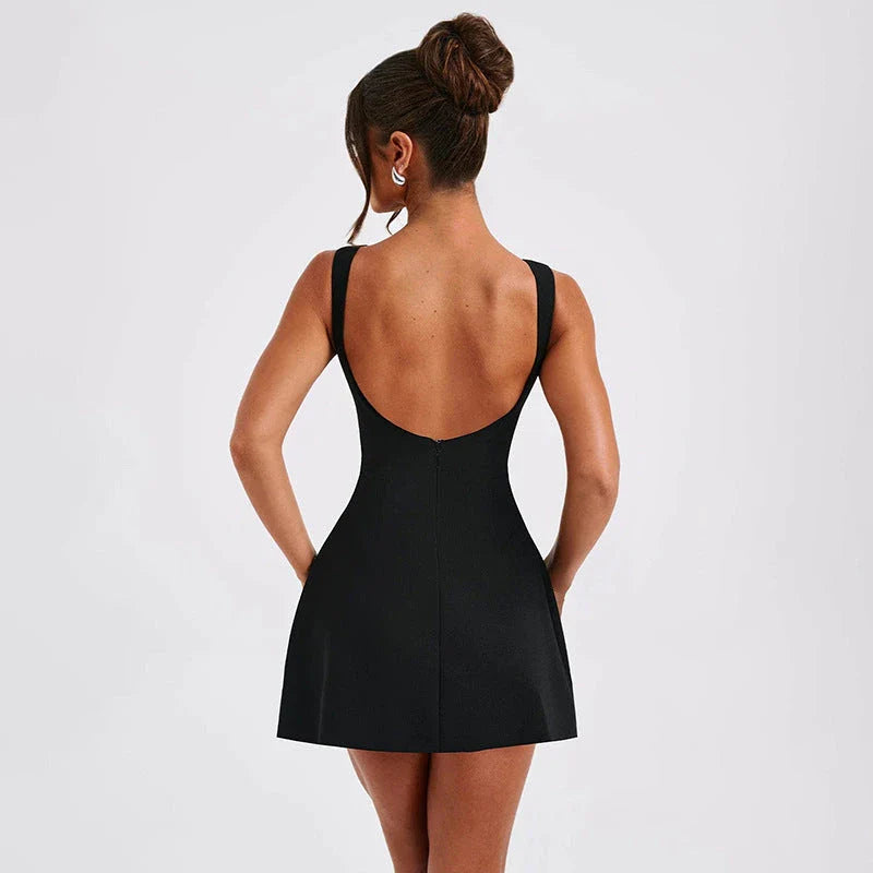 Chic backless summer dress with slim silhouette and sleeveless design, available in black, white, and red colors
