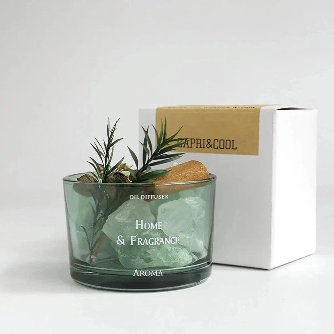 Natural stone essential oil diffuser with decorative flowers and plants, creating a calm and tranquil atmosphere in the home.