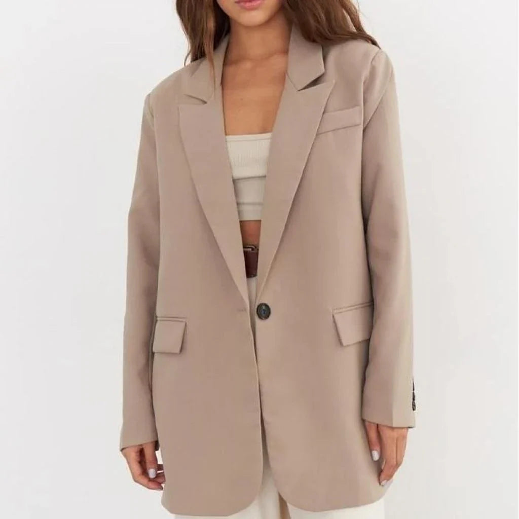 Women's oversized blazer in khaki color, featuring a classic design with a subtle button detail for a sophisticated look.