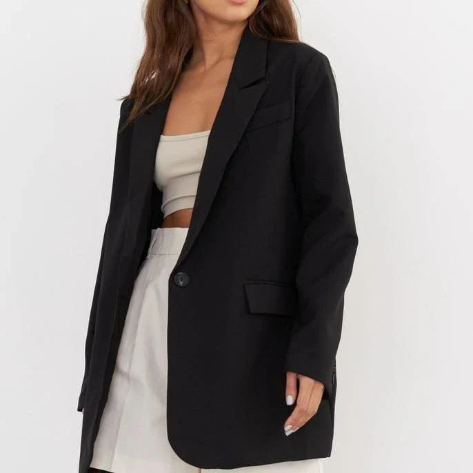 Women's oversized blazer in khaki color, featuring a classic design with a subtle button detail for a sophisticated look.