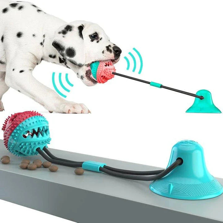 A blue interactive chew ball toy for large dogs with a suction cup, rope, and treat dispenser for dental care and playtime