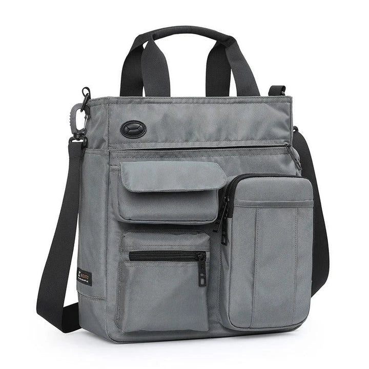 Multifunctional business and leisure commuter bag in grey colour with expandable main compartment and pockets