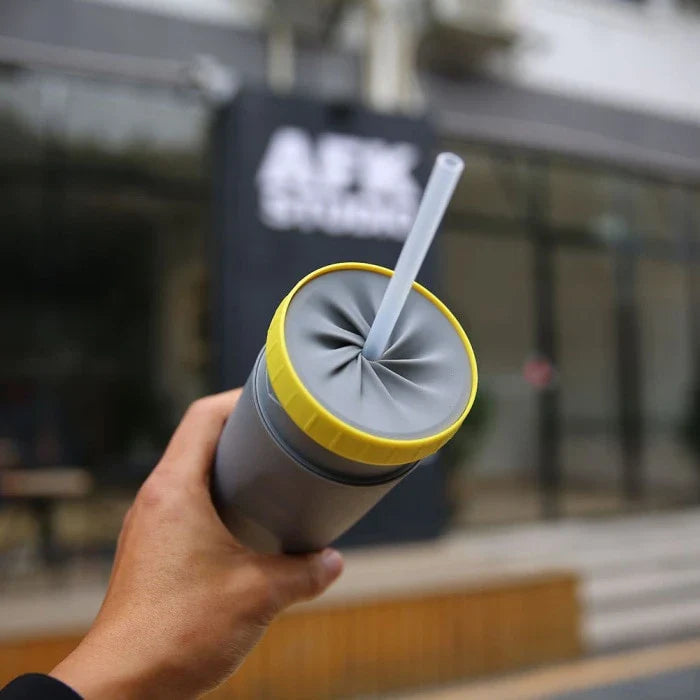 Twist Cup travel tumbler with twist-top mechanism and double-wall insulation for hot and cold drinks