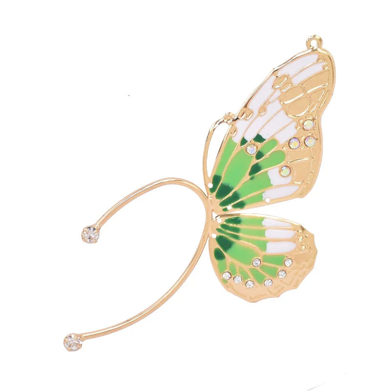 Pair of green alloy butterfly ear cuff earrings with sparkling rhinestones