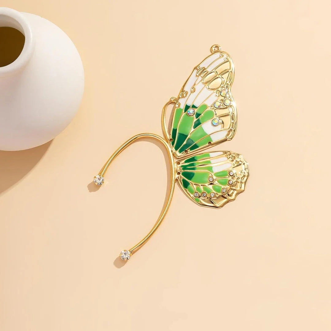 Pair of green alloy butterfly ear cuff earrings with sparkling rhinestones