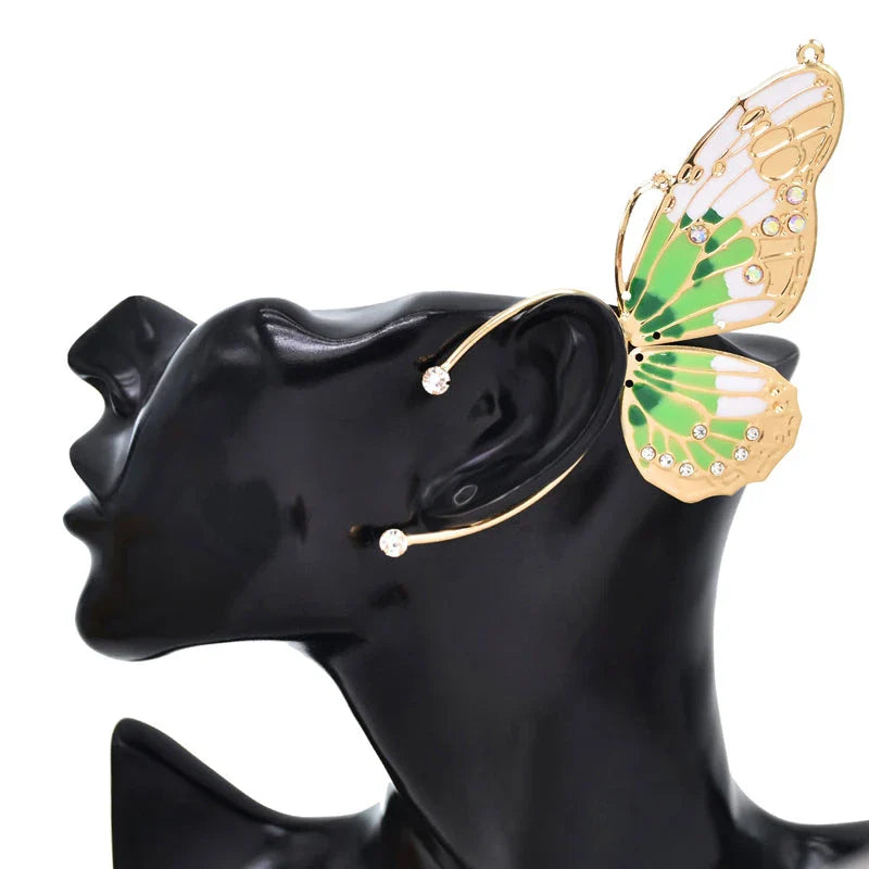 Pair of green alloy butterfly ear cuff earrings with sparkling rhinestones