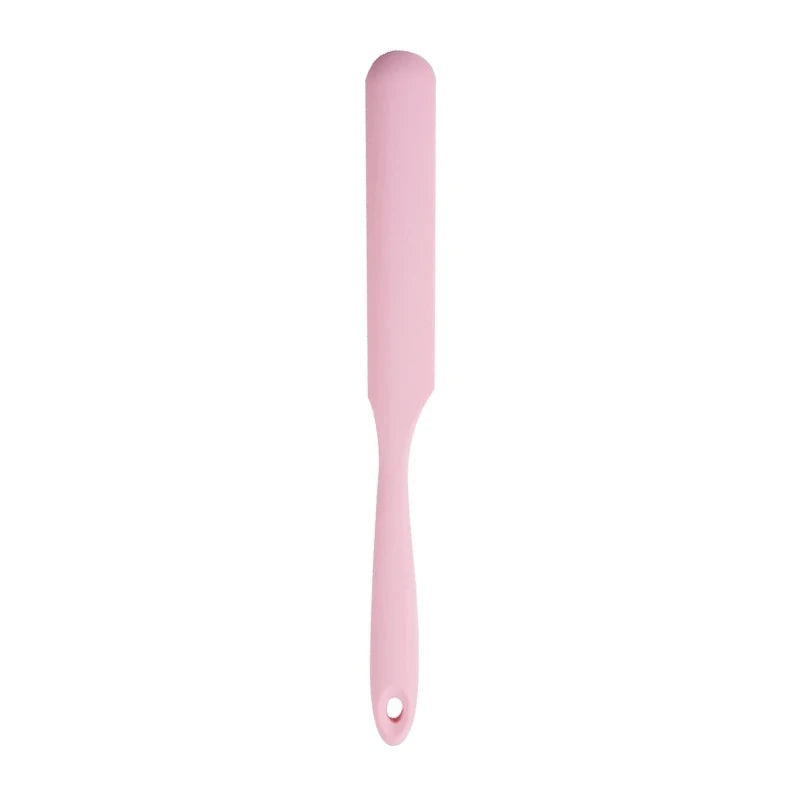 A vibrant red silicone baking spatula with an ergonomic handle and double-sided arc design, perfect for a variety of cooking and baking tasks.