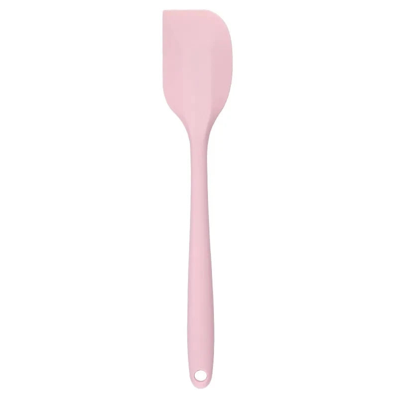 A vibrant red silicone baking spatula with an ergonomic handle and double-sided arc design, perfect for a variety of cooking and baking tasks.